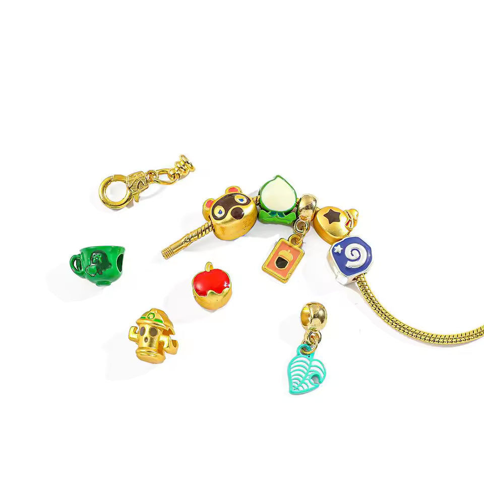 Pulsera Golden crossing + 9 charms 🆓